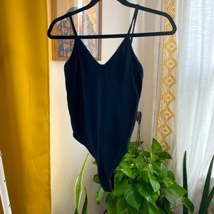 BP thong body suit